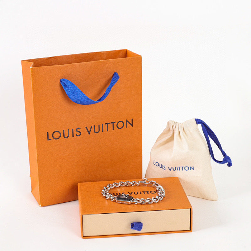 Louis Vuitton Silver-Tone Chain Bracelet with Black LV Plate