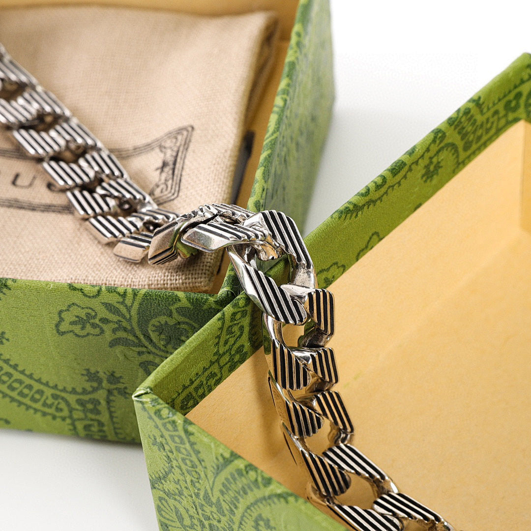 Gucci Silver-Tone Striped Link Bracelet