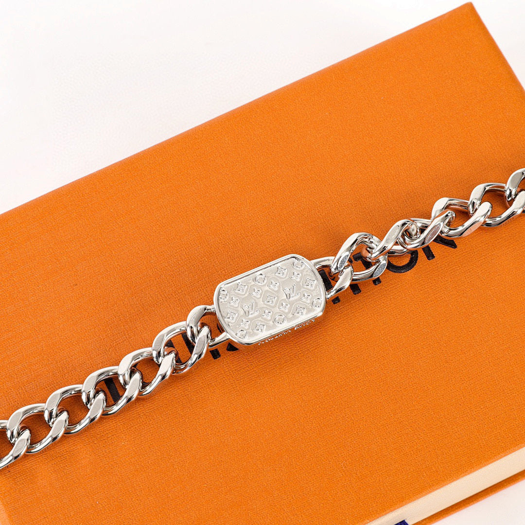 Louis Vuitton Silver-Tone Chain Bracelet with Black LV Plate