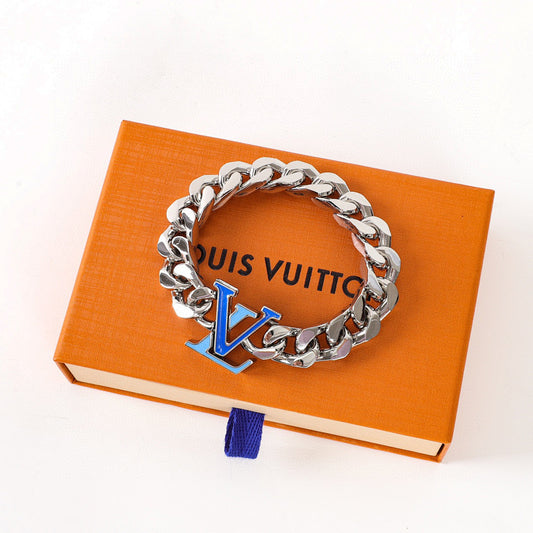 Louis Vuitton Silver-Tone Chain Bracelet with Blue LV Logo