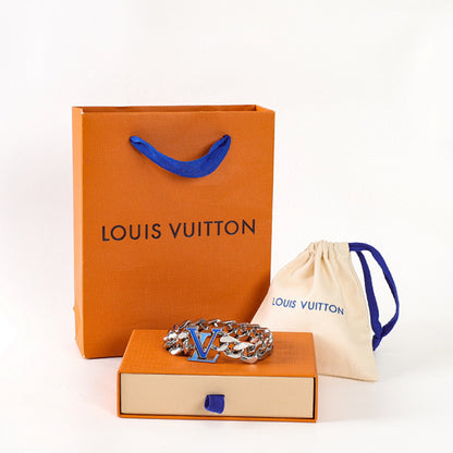 Louis Vuitton Silver-Tone Chain Bracelet with Blue LV Logo