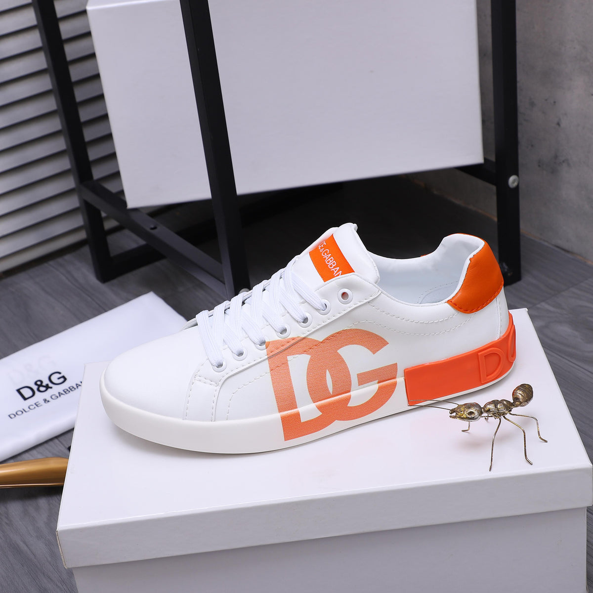 Dolce & Gabbana Portofino DG Logo Low-Top Sneakers – White & Orange