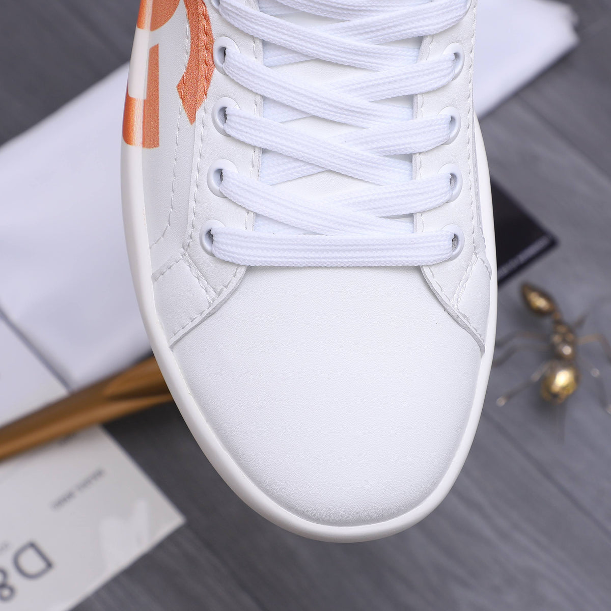 Dolce & Gabbana Portofino DG Logo Low-Top Sneakers – White & Orange