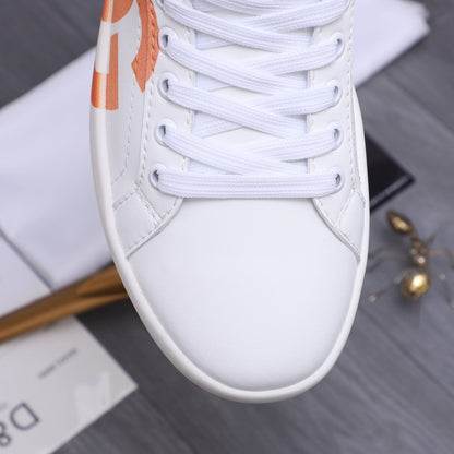 Dolce & Gabbana Portofino DG Logo Low-Top Sneakers – White & Orange