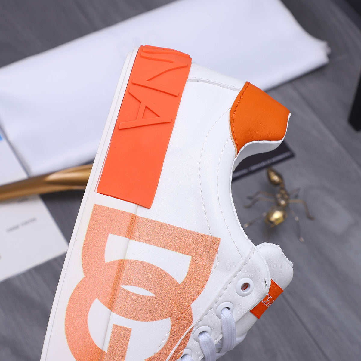 Dolce & Gabbana Portofino DG Logo Low-Top Sneakers – White & Orange