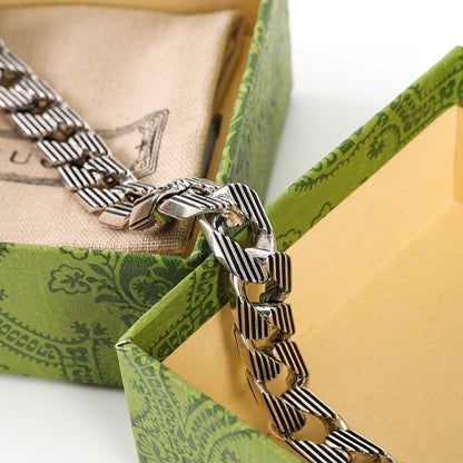Gucci Silver-Tone Striped Link Bracelet