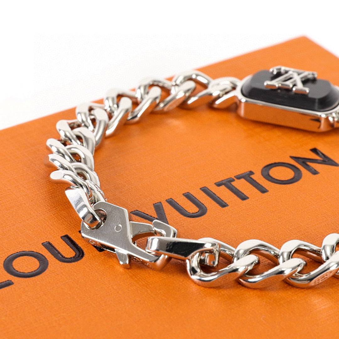 Louis Vuitton Silver-Tone Chain Bracelet with Black LV Plate