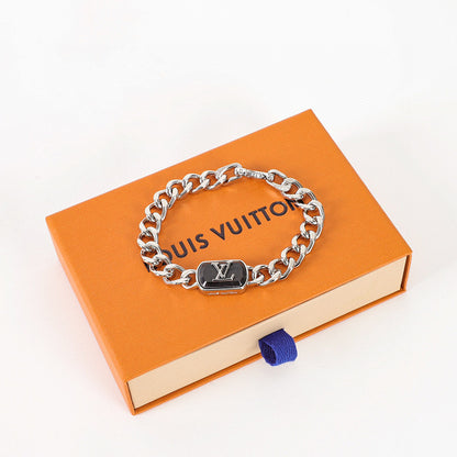 Louis Vuitton Silver-Tone Chain Bracelet with Black LV Plate