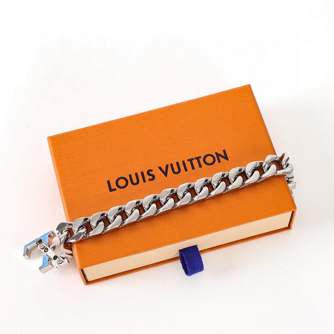 Louis Vuitton Silver-Tone Chain Bracelet with Blue LV Logo
