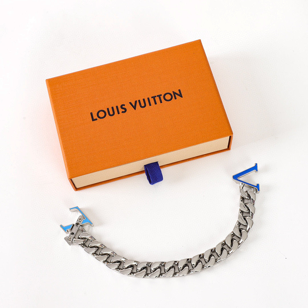 Louis Vuitton Silver-Tone Chain Bracelet with Blue LV Logo