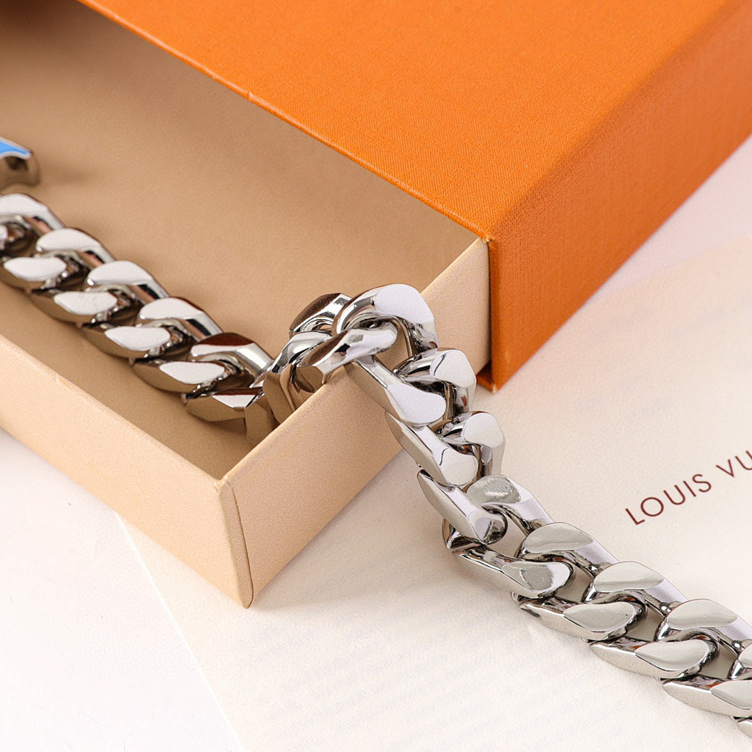 Louis Vuitton Silver-Tone Chain Bracelet with Blue LV Logo